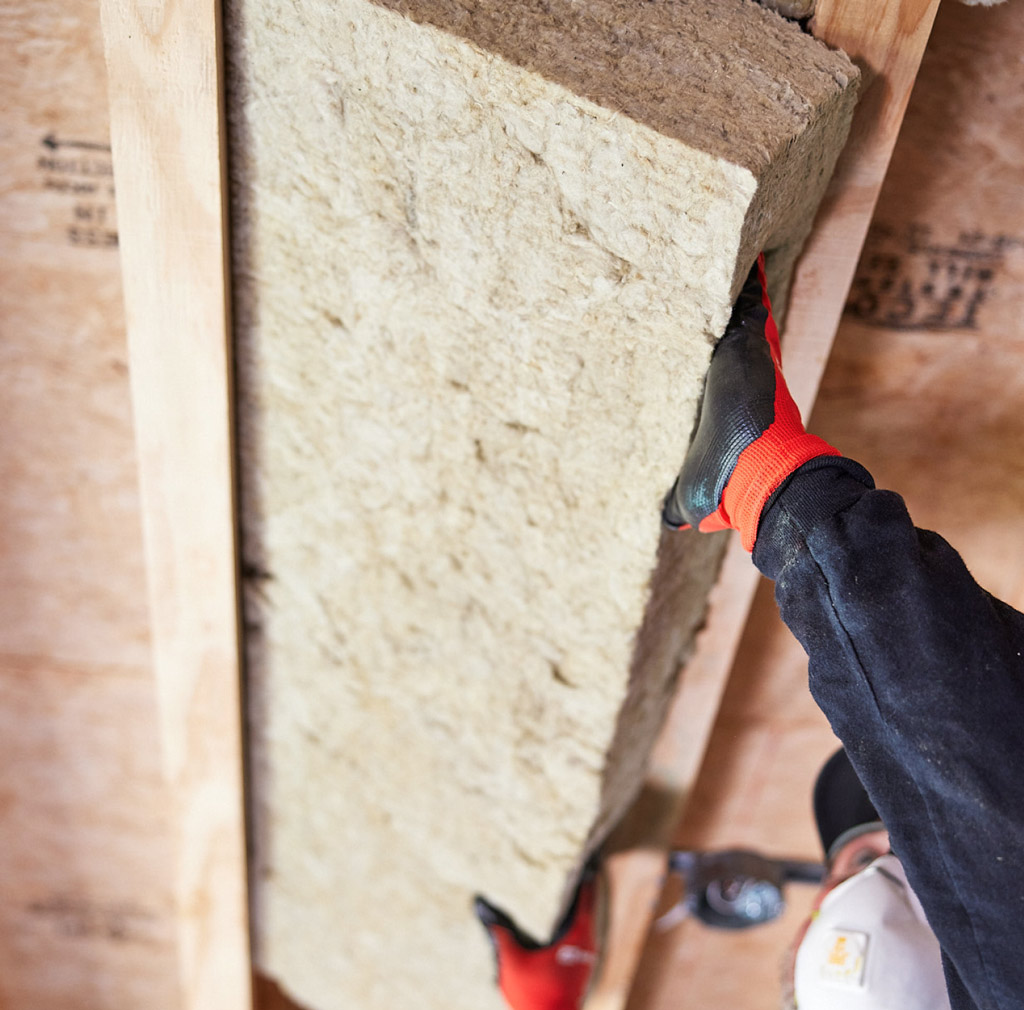 Installing sound dampening insulation in ceiling